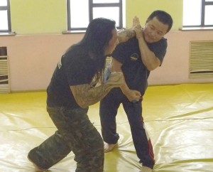 Foronda (left) and Pavel Timofivich test grappling techniques.