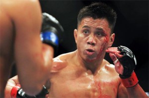 Cung Le (right) sizes up an opponent. CONTRIBUTED PHOTO. 