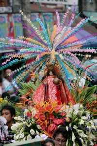 Devotees carry an image of the Child Jesus, one of dozens that were paraded during the celebration of the feast day of the Sto. Nino, a major religious event for Catholics. PHOTO BY RENE H. DILAN