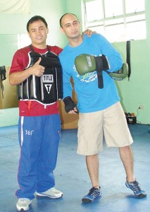  Limbaga (right) with ABAP boxing coach Roel Velasco        PHOTOS COURTESY               OF MARK GARCIA LIMBAGA 