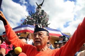 Former President Fidel Ramos does his signature EDSA jump at the People Power monument Monday. The country marks today the 28th anniversary of the peaceful revolution that toppled strongman Ferdinand Marcos. PHOTO BY MIKE DE JUAN 