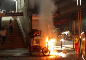 The owner of a motorized tricycle left his vehicle at the foot of the UN Avenue LRT station, unaware that it burst into flames. No one was injured in the incident, but the owner will have to consider some other means of income for the time being. Photo by Ruy Martinez 