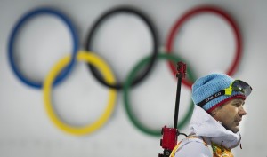 Norway’s Ole Einar Bjoerndalen walks past the Olympic Rings at the Laura Cross-Country Ski and Biathlon Center during the Sochi Winter Olympics in Rosa Khutor near Sochi. AFP PHOTO