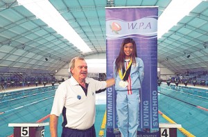  Kyla Soguilon with Briane Reynolds during the awarding ceremonies of the 2014 Western Province Aquatics (WPA) Swimming Gala at the University of Western Cape (UWC) Aquatics Center in Cape Town, South Africa. 