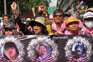 Anti-government protesters hold posters of victims of a recent bomb blast, six-year-old Patcharakorn Yosubon (left) and her brother four-year-old Koravitch Yosubon (center), as they march in a rally outside the national police headquarters in Bangkok on Wednesday. AFP PHOTO\ Kevin Lau, former editor of the Ming Pao newspaper, speaking to the media outside the Ming Pao Building in the Chai Wan district of Hong Kong island.  AFP PHOTO