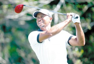  Tiger Woods plays a shot during the pro-am round for The Honda Classic at PGA National Resort and Spa in Palm Beach Gardens, Florida. Afp photo