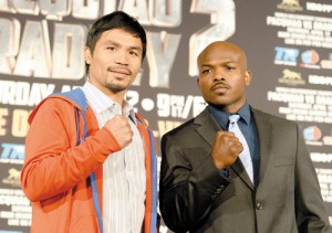 Manny Pacquiao (left) and Tim Bradley of the US pose at a news conference to promote their upcoming WBO welterweight championship boxing rematch in Beverly Hills, California.  AFP PHOTO 