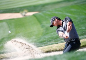 Jason Day plays a shot on the 15th hole during the quarterfinal of the World Golf Championships - Accenture Match Play Championship at The Golf Club at Dove Mountain in Marana, Arizona. AFP PHOTO