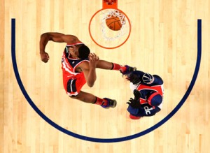 Eastern Conference All-Star John Wall #2 of the Washington Wizards competes in the Sprite Slam Dunk Contest 2014 as part of the 2014 NBA All-Star Weekend at the Smoothie King Center in New Orleans, Louisiana. AFP PHOTO