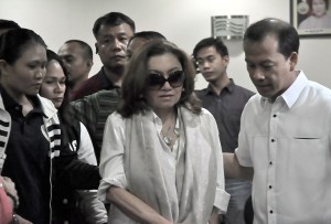 Potential state witness Ruby Tuason arrives at the National Bureau of Investigation headquarters in Manila on Wednesday. She attended a case conference with other whistleblowers to the pork barrel scam, and reviewed the documents to be presented to the Senate Blue Ribbon committee hearing today. PHOTO BY EDWIN MULI