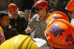 Army Sgt. Andre Varea and members of the Cebu Emergency Rescue Unit Foundation discuss weight calculation methods at aknowledge exchange session in Camp Lapu-Lapu, Cebu