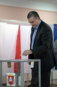 Crimea’s Prime Minister Sergiy Aksyonov casts his vote in a Simferopol local school on Sunday. AFP PHOTO