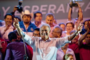 Presidential candidate Salvador Sanchez Ceren celebrates with supporters at the closing of voting for the run-off election in San Salvador, El Salvador on Sunday (Monday in Manila). AFP PHOTO