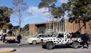 Forces of the Military Council of Tripoli deploy next to the General National Congress in Tripoli on Monday after dozens of protesters stormed the parliament and wounded two of its members. AFP PHOTO