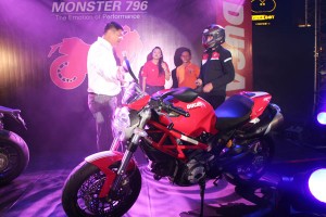 Ducati Phils. chief executive Toti Alberto (left) hands over the key to the new owner of a Monster 796. PHOTO BY RUBEN D. MANAHAN 4TH