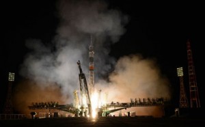 A Russian Soyuz-FG rocket with the Soyuz TMA-12M spacecraft and a crew of US astronaut Steven Swanson, Russian cosmonauts Alexander Skvortsov and Oleg Artemyev aboard, blasts off from a launch pad at the Russian-leased Baikonur cosmodrome in Kazakhstan, early on Wednesday. AFP PHOTO