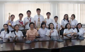 Award winning students from Grace Christian College show off the medals and trophies they won at the World Scholars Cup in Taiwan.