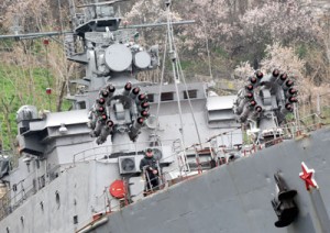 A sailor guards a Russian navy ship in the Bay of Sevastopol in Ukraine on Sunday (Monday in Manila). AFP PHOTO