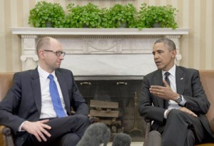 United States President Barack Obama (right) talking to Ukrainian Prime Minister Arseniy Yatsenyuk during their meeting at the Oval Office of the White House in Washington, D.C., on Wednesday (Thursday in Manila). AFP PHOTO