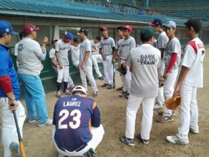 International Little League of Manila-Philippines in huddle as team manager Arsenic Laurel gives instructions and motivations to the young members of the local team during their break at the Rizal Memorial Baseball Diamond. CONTRIBUTED PHOTO