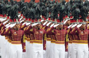  Members of Class Mandilaab salute during their commencement exercises at the Philippine National Police Academy in Camp General Mariano Castaneda in Silang, Cavite, on Monday. MALACAÑANG PHOTO 