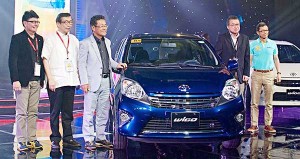 Top Toyota officers (from left) Ariel Arias, Dr. David Go, Michinobu Sugata (also seen at right), Nobohiko Ono and Yohei Murase present the Toyota Wigo in Cebu. Ono, chief designer at mini-car specialist Daihatsu, penned the Wigo.