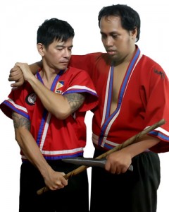 PhilMaHoF Executive Director Punong Lakan Garitony Nicolas (left) demonstrates an arnis technique. CONTRIBUTED PHOTO