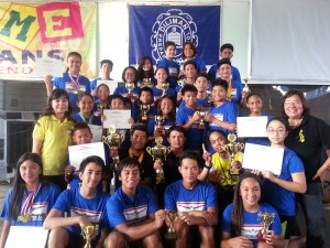 Philippine Swimming League (PSL) President Susan Papa and Secretary General Maria Susan Benasa pose with the Most Outstanding Swimmers in the PSL 57th Leg Series dubbed as PSL-Magnolia Swimfest at the Diliman Preparatory School swimming pool in Quezon City. CONTRIBUTED PHOTO