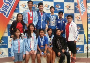 Swimmers Sean Terrence Zamora, Delia Cordero, Lans Donato, Martin Pupos, Sean Elijah Enero, Paul Cusing Paula Cusing, Celine Cusing and Julian Lowenstein Lazaro together with delegation head Guia Llaguno and head coach Ryan Robles. CONTRIBUTED PHOTO