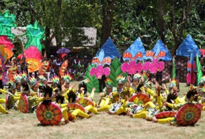 Clad in sea creature-inspired costumes, performers dance to the beat of the drums to mark the opening of the Sinugdang Festival, which coincides with the anniversary of the First Catholic Mass of the Philippines in Limasawa Island