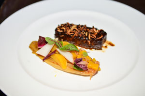 The Adobo Spiced Belly with citrus glazed endive, pickled mango, puffed wild rice, and kalamansi lime 