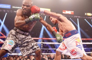 Manny Pacquiao scores a clean hit on Timothy Bradley in their WBO welterweight title match at MGM Grand Arena in Las Vegas on Sunday. Pacquiao won via unanimous decision in 12 rounds to avenge his 2012 loss to the previously unbeaten American. AFP PHOTO