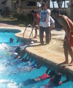 Philippine Swimming League President Susan Papa gives swimming lesson to Aklanon under the Philippine Red Cross Boracay- Malay Chapter. The Youth Swimming Program headed by Elena Brugger, aims to target thousands of children to learn how to swim. CONTIRBUTED PHOTO