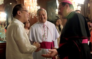   President Benigno Aquino 3rd welcomes Secretary of the Pontifical Council for the Family Bishop Jean Laffitte during the bishop’s courtesy call at Malacañang on Wednesday. Accompanying Laffitte is Archbishop Socrates Villegas of Lingayen-Dagupan, the president of the Catholic Bishops Conference of the Philippines . MALACAÑANG PHOTO 