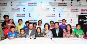 n  The ‘Adopt a Diabetic Child’ beneficiaries and some parents with Clavio; UP-PGH Chief of Endocrinology Dr. Sioksoan Cua (center); and RiteMed general manager Nick Salud (6th from left) at the project launch