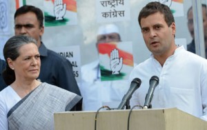 In this photograph taken on May 16, 2014, India’s Congress Party President Sonia Gandhi (left) looks on as party Vice President Rahul Gandhi speaks during a press conference at the party headquarters in New Delhi. AFP PHOTO