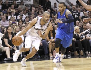 Tony Parker No.9 of the San Antonio Spurs drives around Monta Ellis No.11 of the Dallas Mavericks in Game Seven of the Western Conference Quarterfinals during the 2014 NBA Playoffs at the AT&T Center in San Antonio, Texas. AFP PHOTO