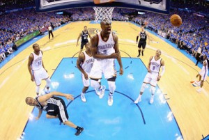 Serge Ibaka No.9 of the Oklahoma City Thunder reacts after blocking the shot of Tony Parker No.9 of the San Antonio Spurs in the second half during Game Three of the Western Conference Finals of the 2014 NBA Playoffs at Chesapeake Energy Arena in Oklahoma City, Oklahoma. AFP PHOTO