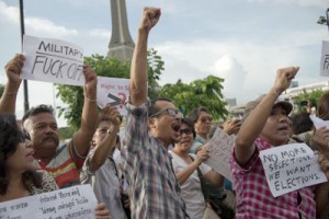 People protest during an anti coup rally, at Victory monument in Bangkok on Wednesday. AFP PHOTO