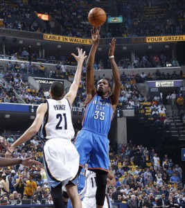 Kevin Durant #35 of the Oklahoma City Thunder shoots the ball over Tayshaun Prince #21 of the Memphis Grizzlies during Game Six of the Western Conference Quarterfinals of the 2014 NBA Playoffs at FedEx Forum in Memphis, Tennessee. AFP PHOTO