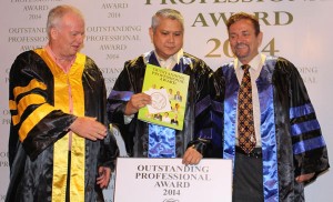 The Manila Times CEO and President Dante Ang 2nd (center) receives on Wednesday the Outstanding Professional Award 2014 from Superbrand Marketing International Inc. Chairman Karl Mclean and SMI Managing Director Larry Brouhard. PHOTO BY RUY MARTINEZ