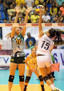 Adamson skipper Marleen Cortel unleashes a power tip off FEU’s guest player Rachel Ann Daquis during their Game 1 of the semifinals.