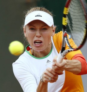 Paris: Denmark’s Caroline Wozniacki returns the ball to Belgium’s Yanina Wickmayer during their French tennis Open first round match at the Roland Garros stadium in Paris. AFP PHOTO