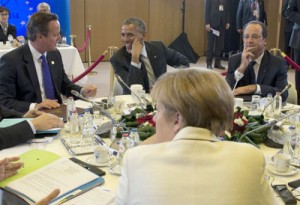 Britain’s Prime Minister David Cameron (left), US President Barack Obama (second from left), France’s President Francois Hollande (right) and Germany’s Chancellor Angela Merkel talk during a working session at the Group of Seven summit at the European Council headquarters on Thursday in Brussels. AFP PHOTO