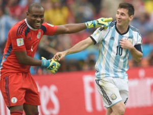 Argentina’s forward Lionel Messi (right) and Nigeria’s goalkeeper Vincent Enyeama smile during a Group F football match between Nigeria and Argentina at the Beira-Rio Stadium in Porto Alegre during the 2014 FIFA World Cup. AFP PHOTO