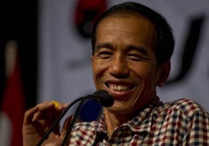A photo taken on June 14 shows Indonesian frontrunner presidential candidate Joko Widodo, popularly known by his nickname Jokowi, addressing supporters during campaign for the July 9 election in his hometown in Solo City. AFP PHOTO