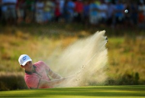 Martin Kaymer of Germany hits a shot from a greenside bunker on the tenth hole during the third round of the 114th U.S. Open at Pinehurst Resort & Country Club, Course No. 2 in Pinehurst, North Carolina. AFP PHOTO