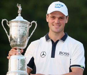 Martin Kaymer of Germany celebrates with the trophy after his eightstroke victory during the final round of the 114th U.S. Open at Pinehurst Resort & Country Club, Course No. 2 in Pinehurst, North Carolina. AFP PHOTO