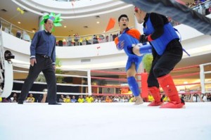 Two kung fu practitioners engage in a fight during the lèi tái tournament organized by Kong Han Athletic Club,during the celebration of its77th anniversaryat Lucky Chinatown Mall in Binondo,Manila. CONTRIBUTED PHOTO 