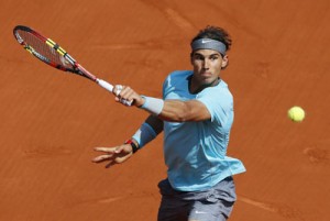 Spain’s Rafael Nadal hits a return to Argentina’s Leonardo Mayer during their French tennis Open third round match at the Roland Garros stadium in Paris. AFP PHOTO